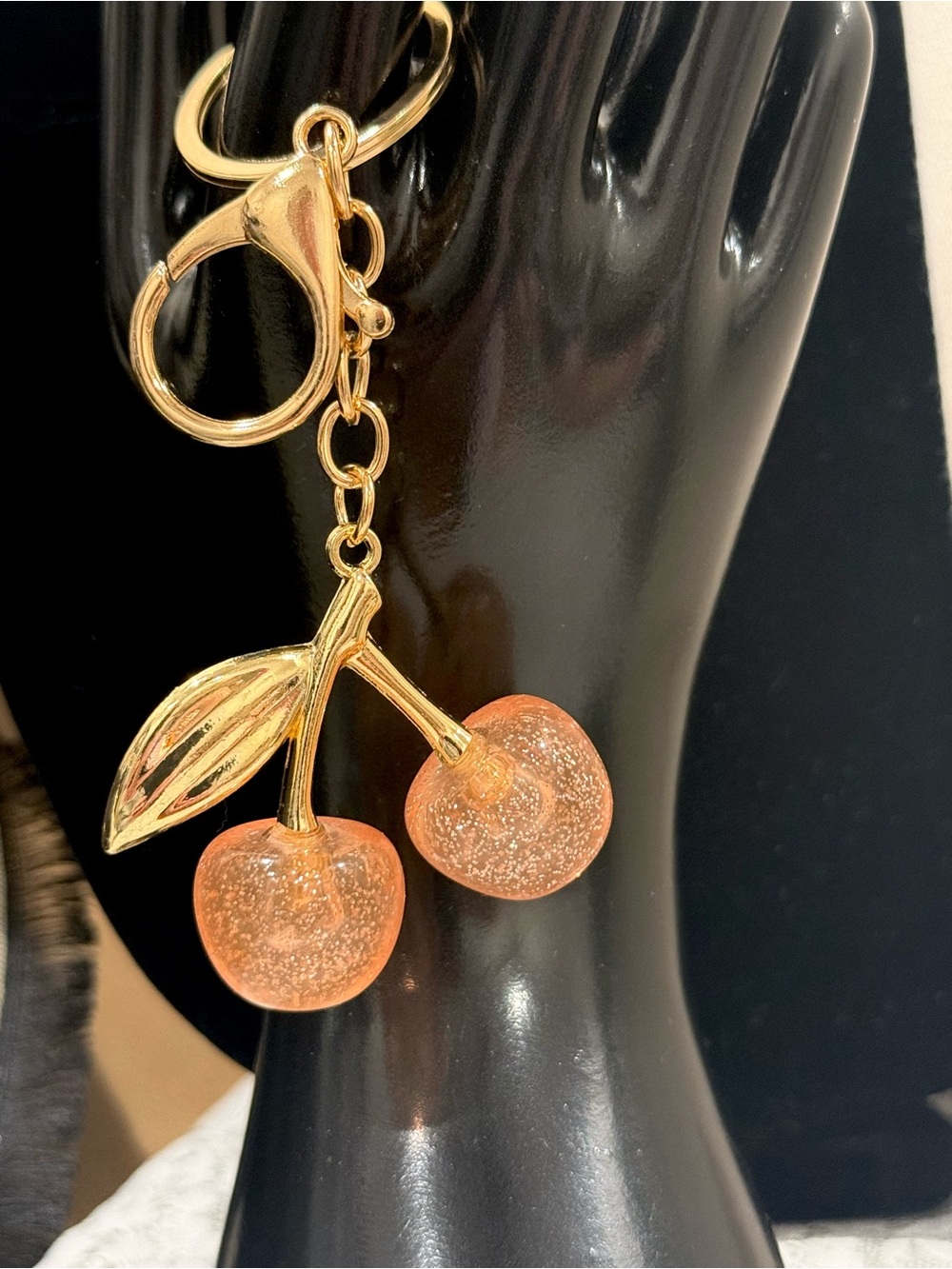 Gold-Tone Cherry Pendant Keychain - peach Glitter